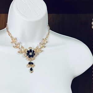 Elegant Gold and Black Floral Necklace and Earrings Set